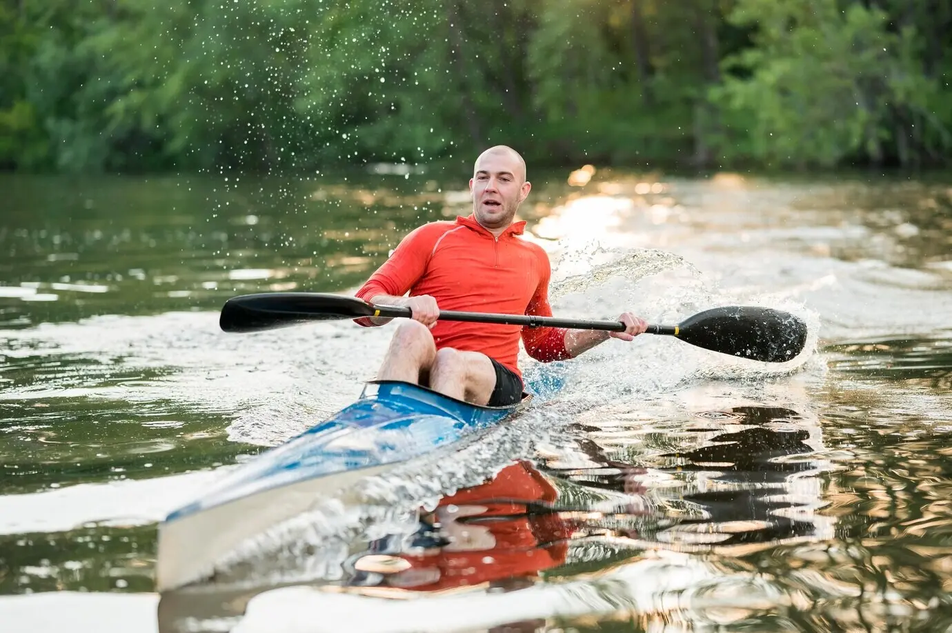 Smiling man enjoying himself outdoors